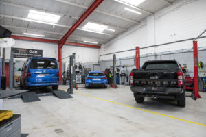 Cars in CJ Auto Service Garage